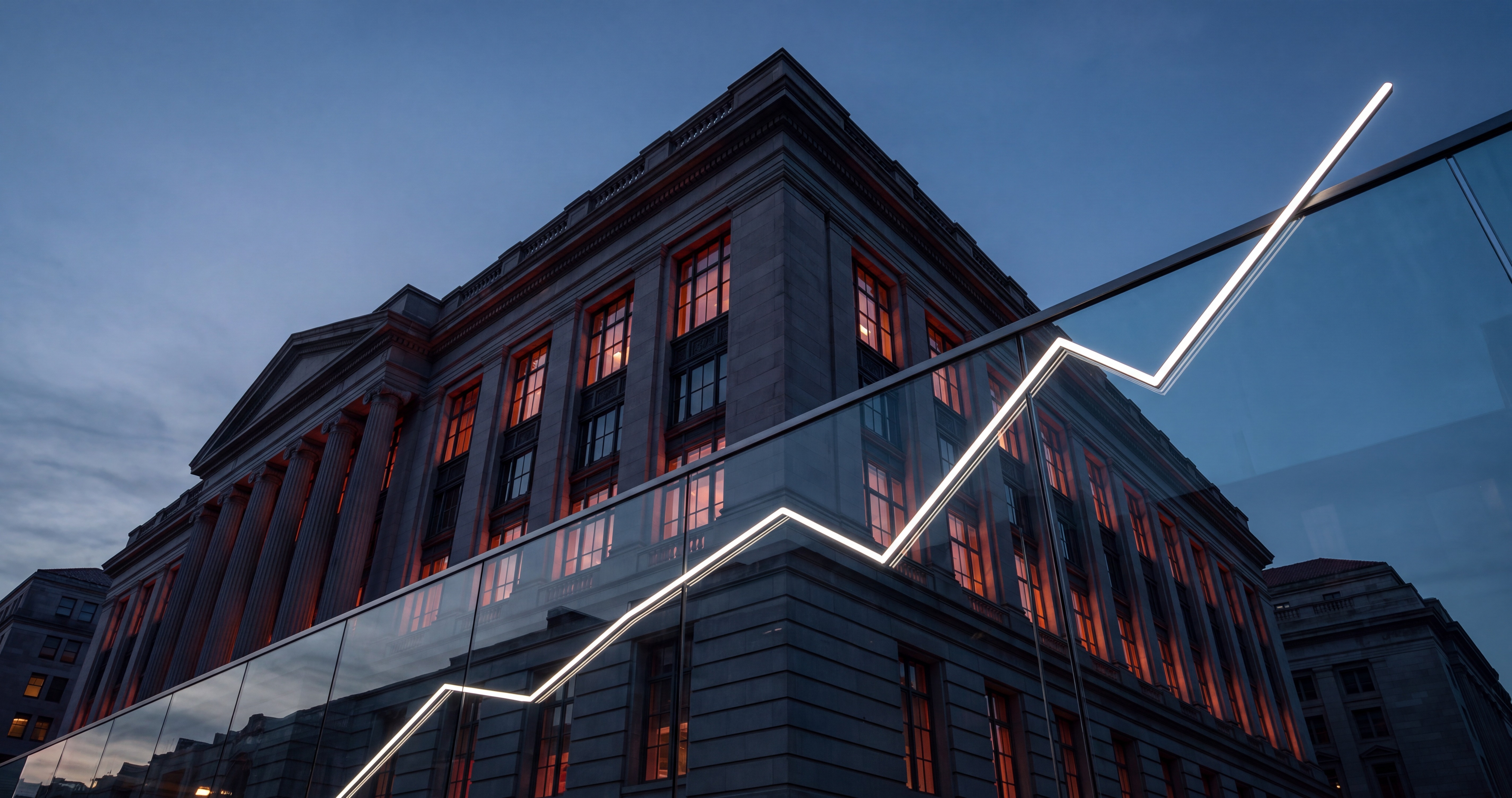 Central bank building at dusk with an illuminated upward market line